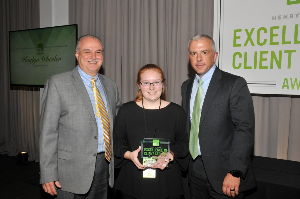 photograph of the presentation of the 2018 Henry W. Bloch Excellence in Client Service Award for Kaylyn Wheeler