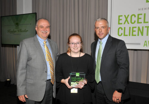 photograph of the presentation of the 2018 Henry W. Bloch Excellence in Client Service Award for Kaylyn Wheeler